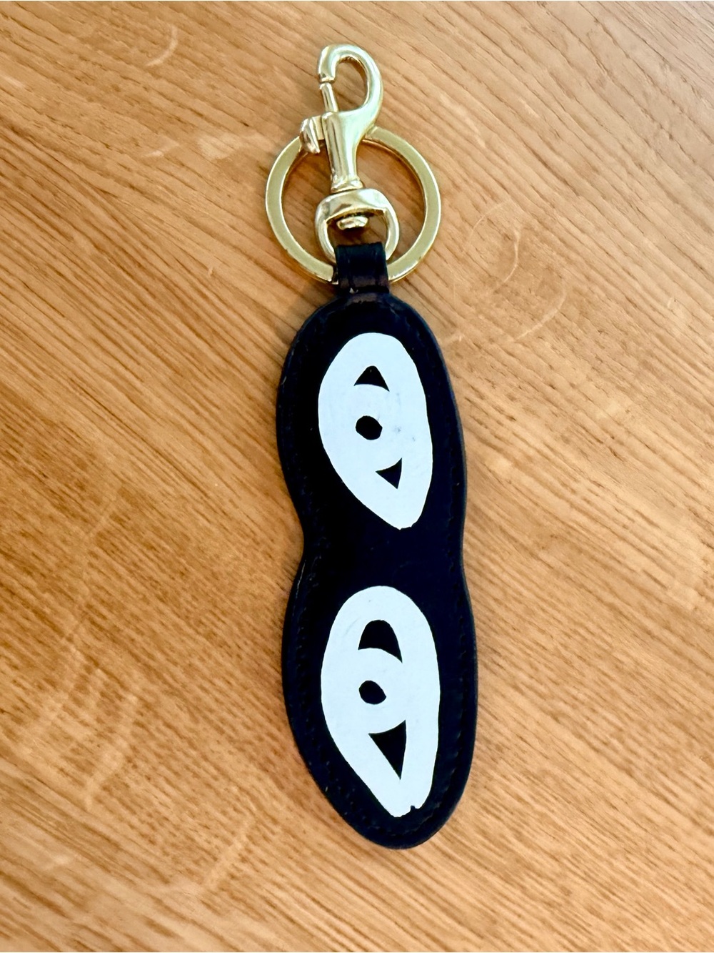 Clare V eyes keychain fob black and cream EUC